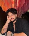 Ali K.